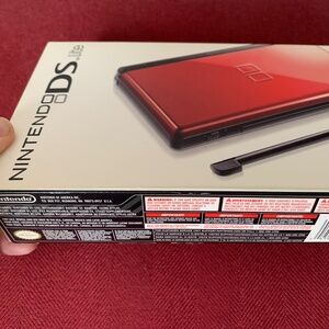 Nintendo DS Lite with games.